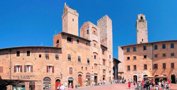 Explore Siena, Italy's enchanting medieval hill town. Witness the breathtaking Piazza del Campo, climb the Torre del Mangia for panoramic views, and marvel at the Duomo's artistic treasures.  Indulge in delicious Tuscan cuisine and discover the city's rich history and Palio horse racing tradition.