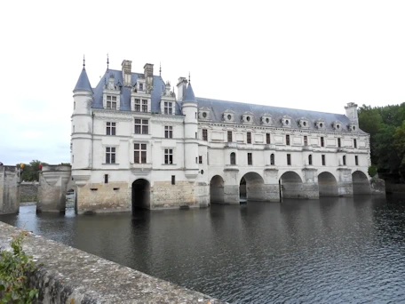 Discover Château de Chenonceau, the 'Ladies' castle uniquely built spanning the Cher River in the Loire Valley.  See photos of Chenonceau, watch our movie, and get the tips and logistical information you need to make your visit a successful one.