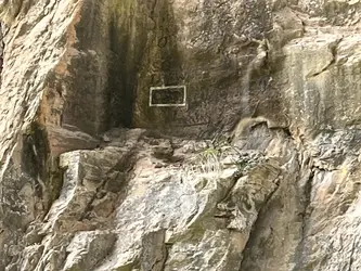 That white box is a rectangle painted around the initials <i>G.W.</i> which 
                        local legend attributes to George Washington. The initials are 23 feet up on the wall of the 
                        bridge, on the north side, across from the trail along Cedar Creek.